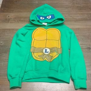Teenage Mutant Ninja Turtles hooded sweatshirt.